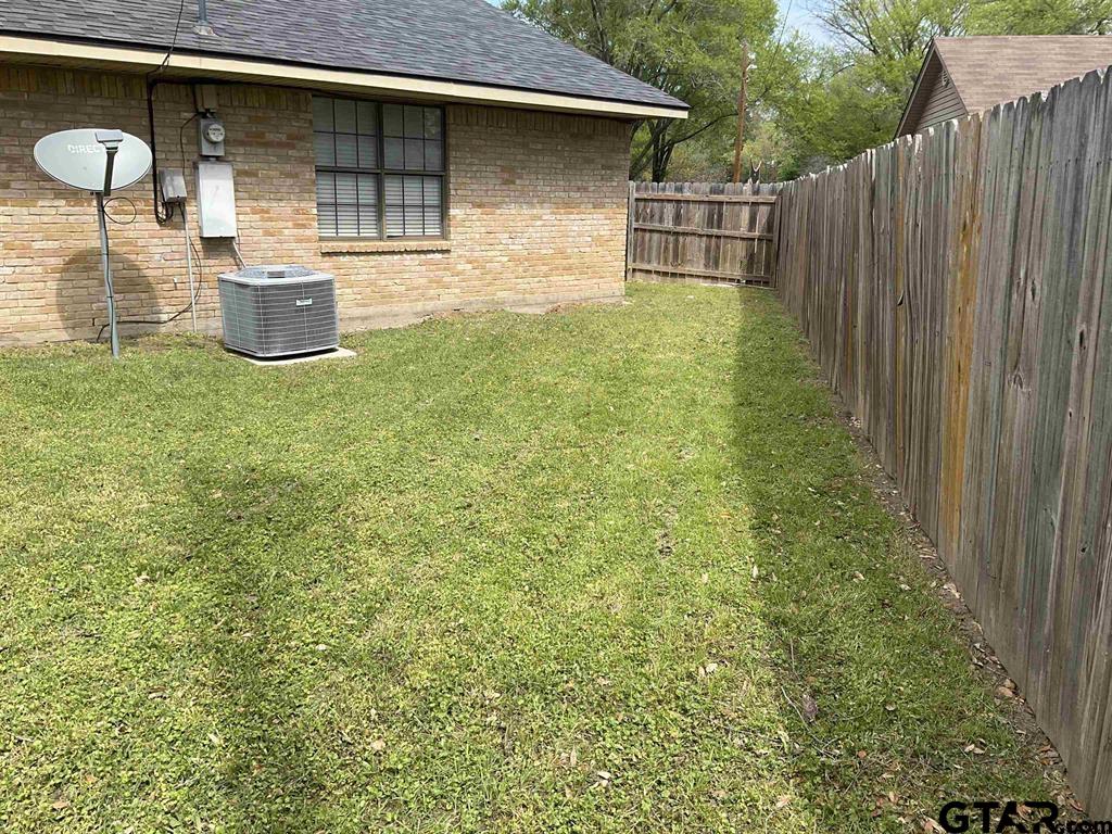 5101 Foxglove Circle Tyler, TX 75703 - Photo 12 of 12 a front view of a house with yard