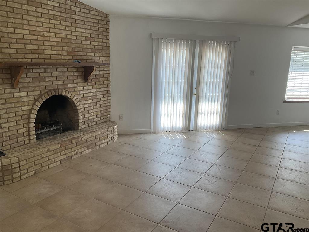 5101 Foxglove Circle Tyler, TX 75703 - Photo 2 of 12 a view of an empty room with windows