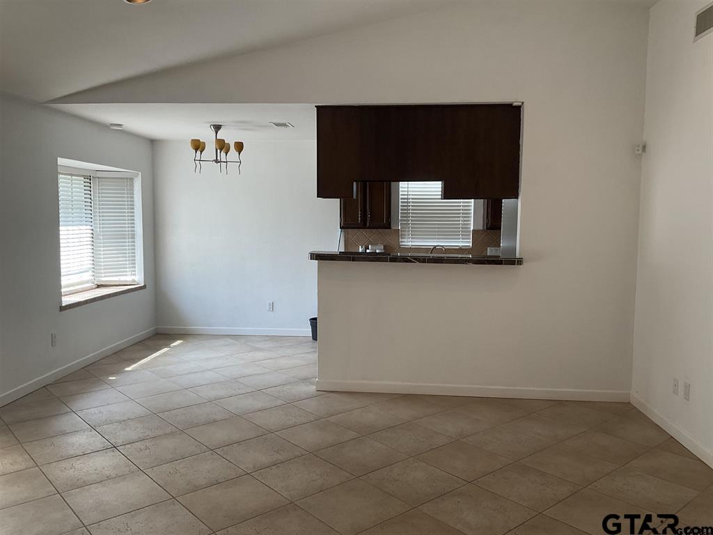 5101 Foxglove Circle Tyler, TX 75703 - Photo 4 of 12 a kitchen with a sink cabinets and stainless steel appliances