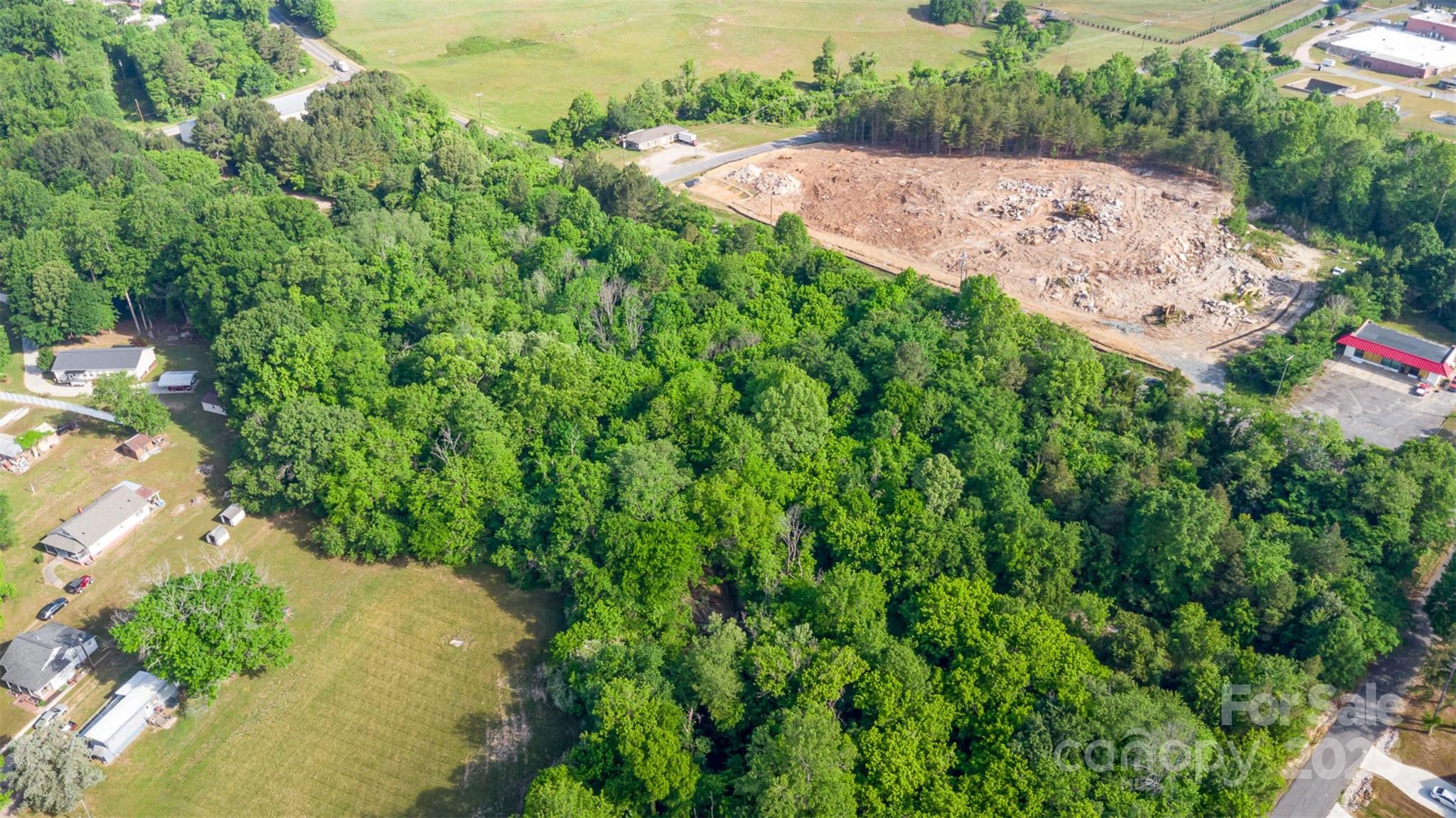0 Pump Station Road Kannapolis, NC 28081 - Photo 4 of 14 an aerial view of a house with a yard and garden