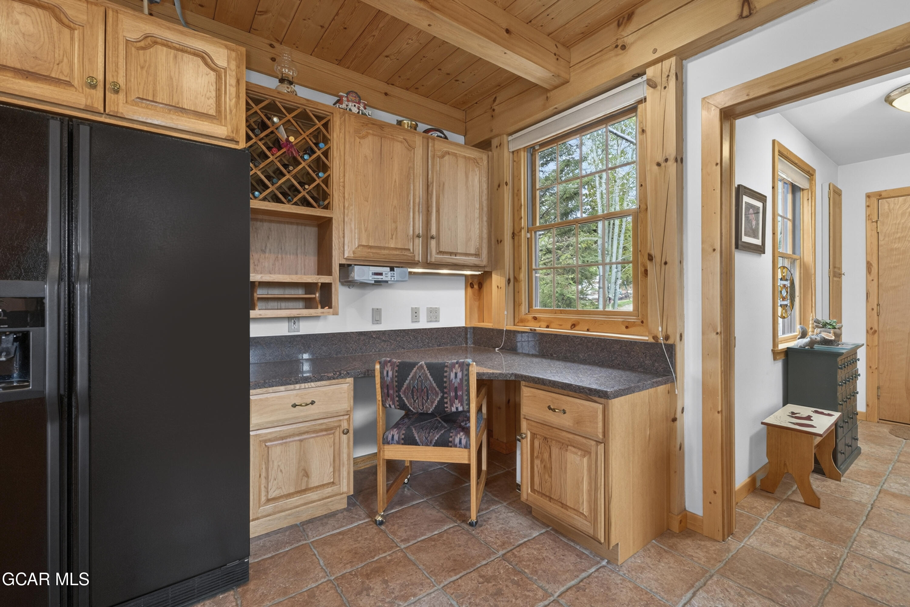 400 Ridge Road Tabernash, CO 80478 - Photo 33 of 50 a kitchen with a sink and a refrigerator