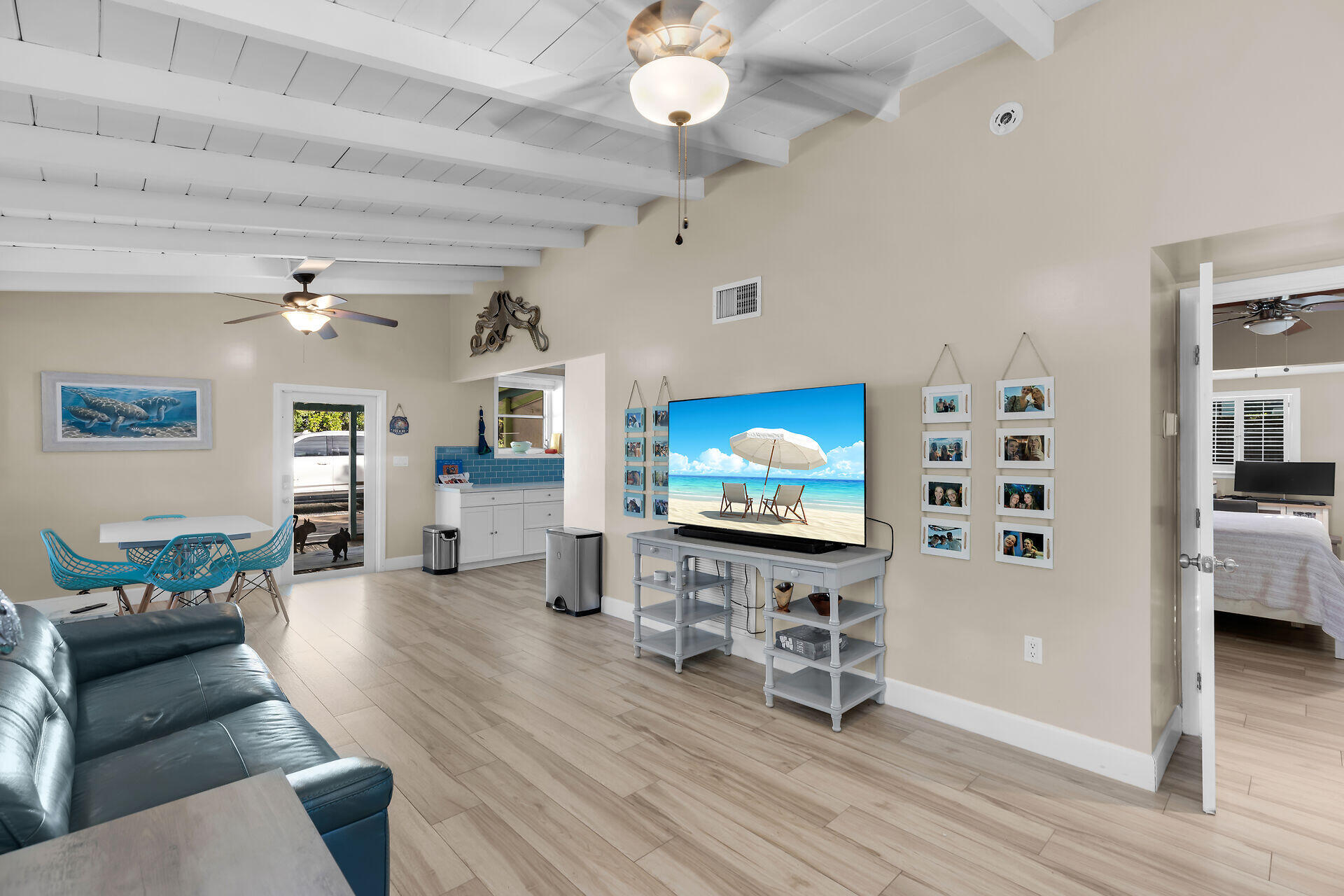 28 Tarpon Avenue Key Largo, FL 33037 - Photo 3 of 42 a living room with furniture and a flat screen tv