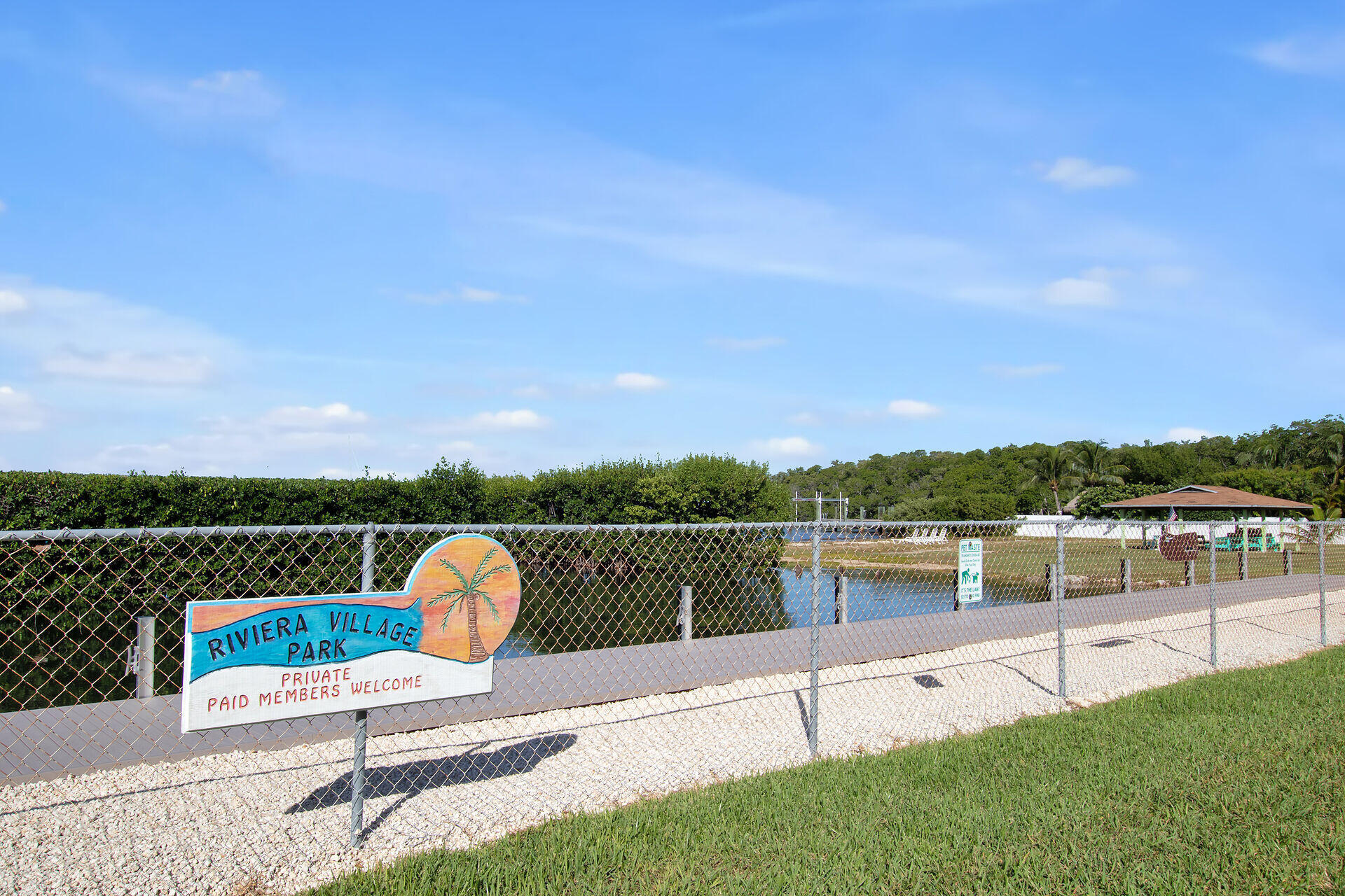 28 Tarpon Avenue Key Largo, FL 33037 - Photo 37 of 42 a view of a lake with couches in the patio and a yard
