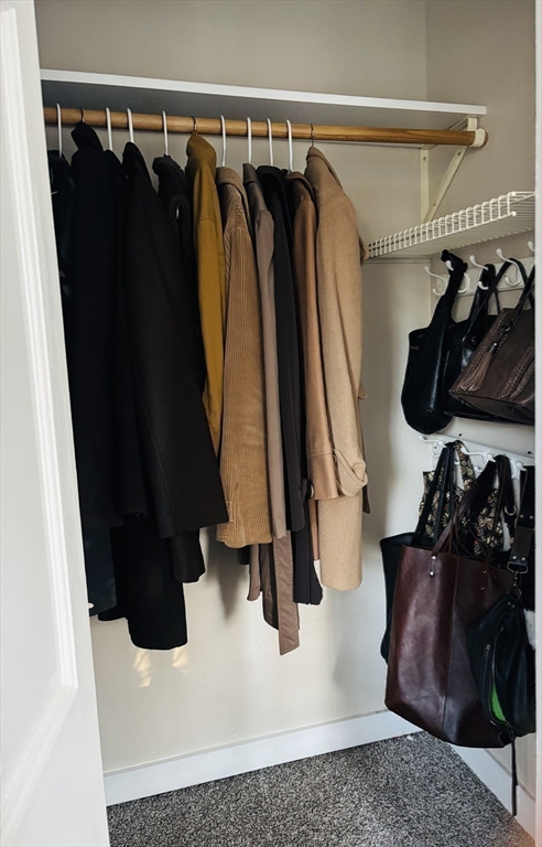 21 Highland Park Road Rutland, MA 01543 - Photo 15 of 41 a view of walk in closet with clothes and shoes