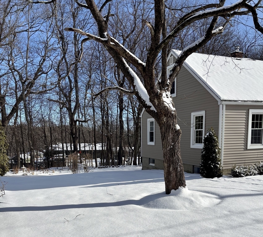 21 Highland Park Road Rutland, MA 01543 - Photo 3 of 41 a view of a building with a yard