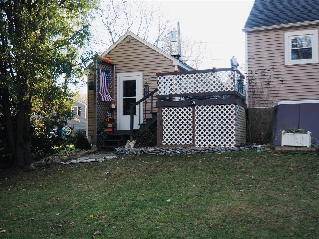 21 Highland Park Road Rutland, MA 01543 - Photo 32 of 41 a front view of a house with a garden