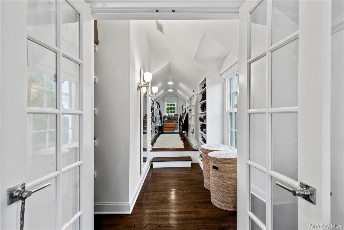 4 Martin Road Rye, NY 10580 - Photo 15 of 28 a view of a hallway with wooden floor and staircase