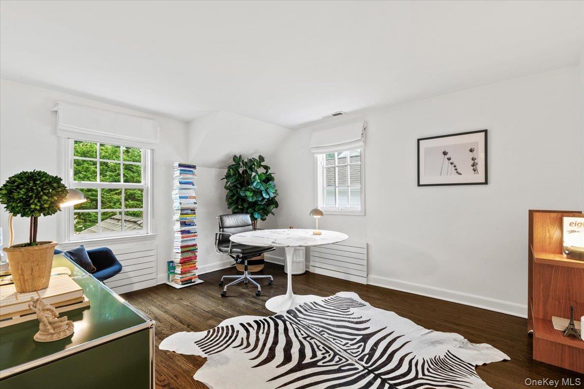 4 Martin Road Rye, NY 10580 - Photo 18 of 28 a living room with furniture a window and a potted plant