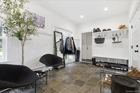 a room with furniture and gym equipment