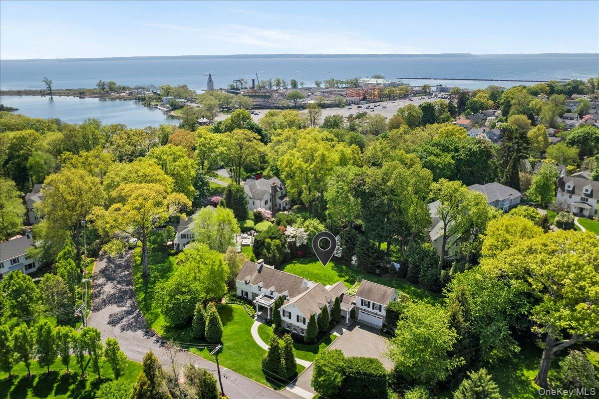 4 Martin Road Rye, NY 10580 - Photo 25 of 28 an aerial view of a city with lots of residential buildings ocean and mountain view in back
