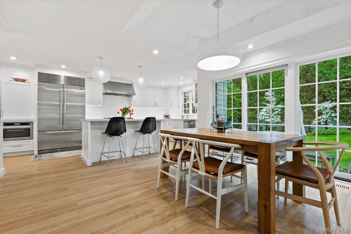 4 Martin Road Rye, NY 10580 - Photo 8 of 28 a view of a dining room with furniture window and wooden floor