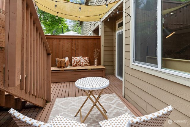 a view of deck with wooden floor and fence