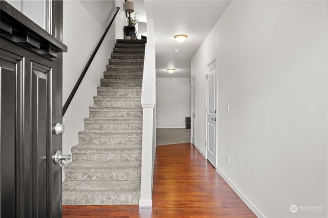 a view of an empty room with racks on the wall