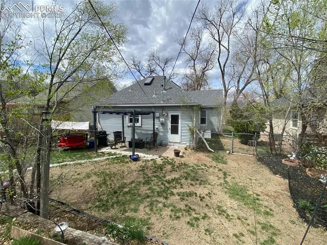 a house view with sitting space and garden space