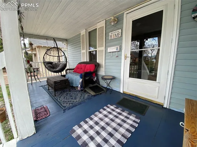 a living room with furniture and a window