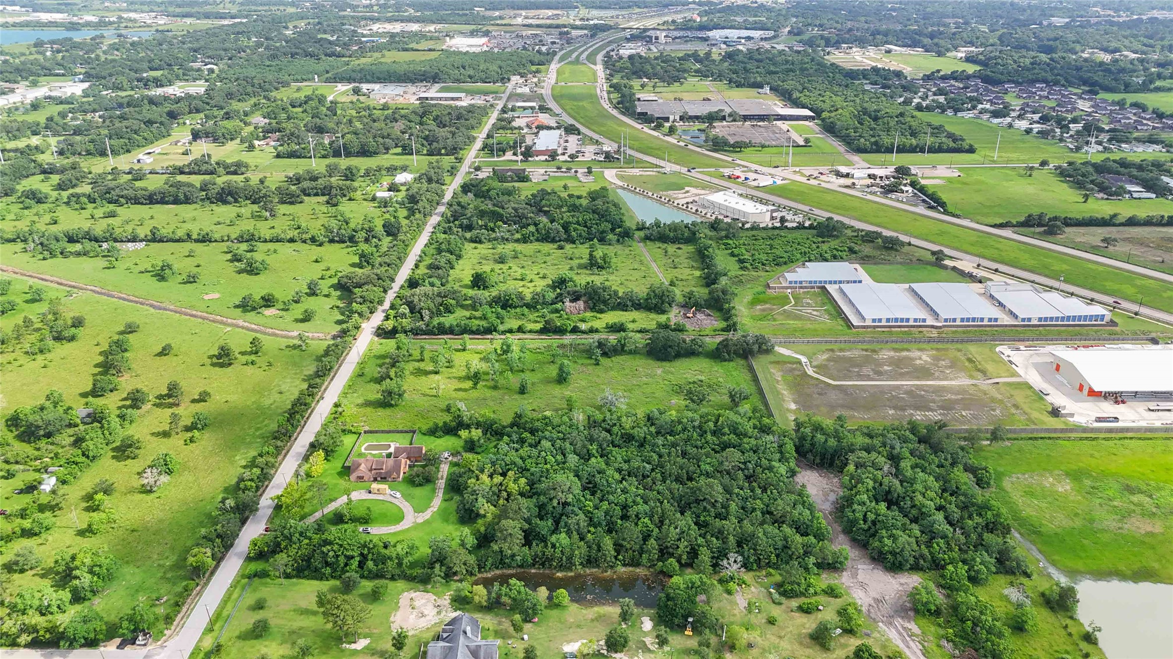 0 Clifford Street Alvin, TX 77511 - Photo 5 of 6 a view of a yard with plants