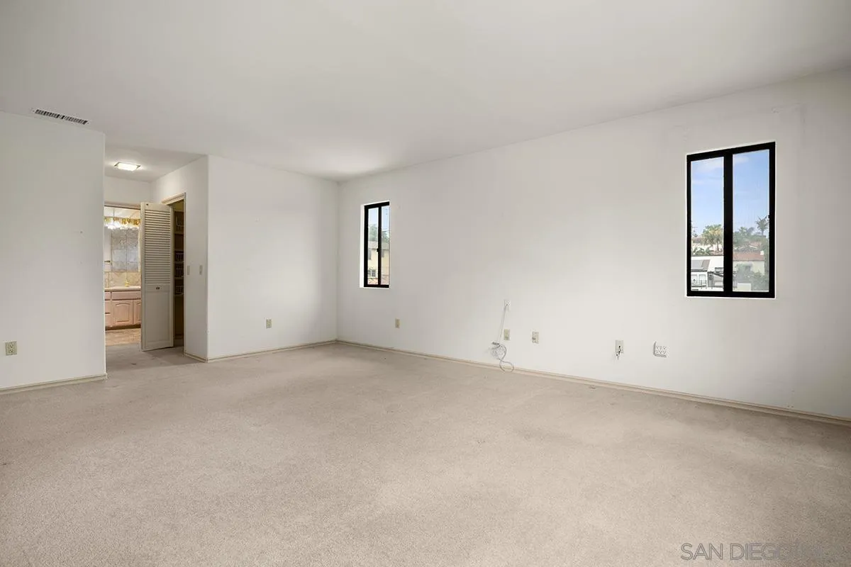 3130 Goldfinch Street San Diego, CA 92103 - Photo 31 of 59 a view of an empty room with a window