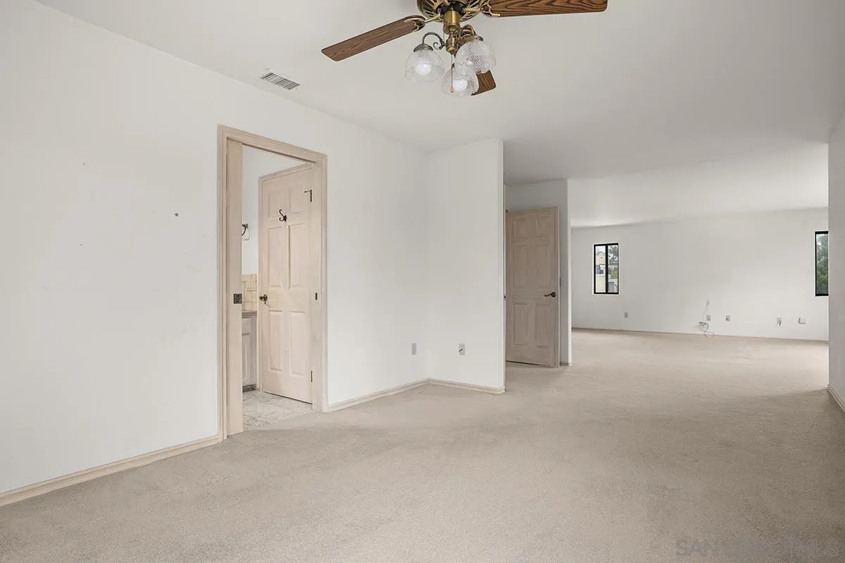 3130 Goldfinch Street San Diego, CA 92103 - Photo 32 of 59 a view of empty room with a ceiling fan