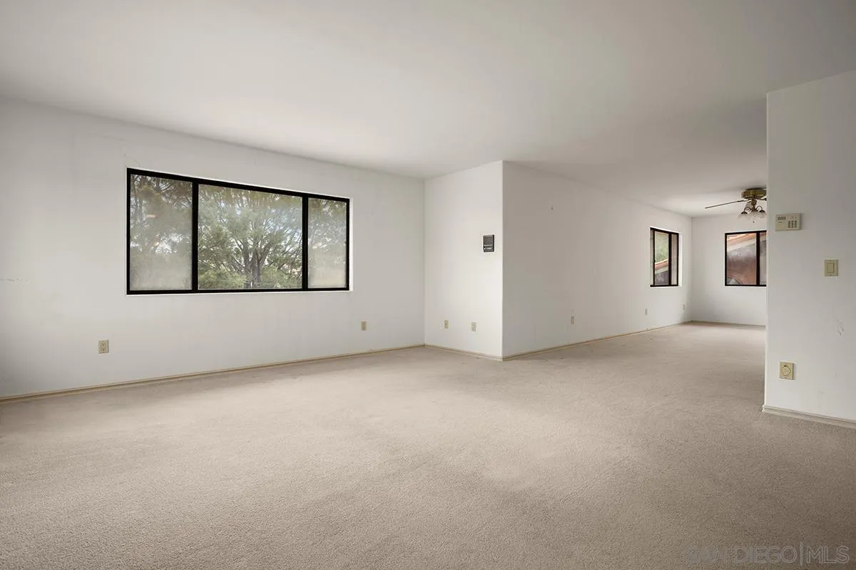 3130 Goldfinch Street San Diego, CA 92103 - Photo 33 of 59 an empty room with windows and closet