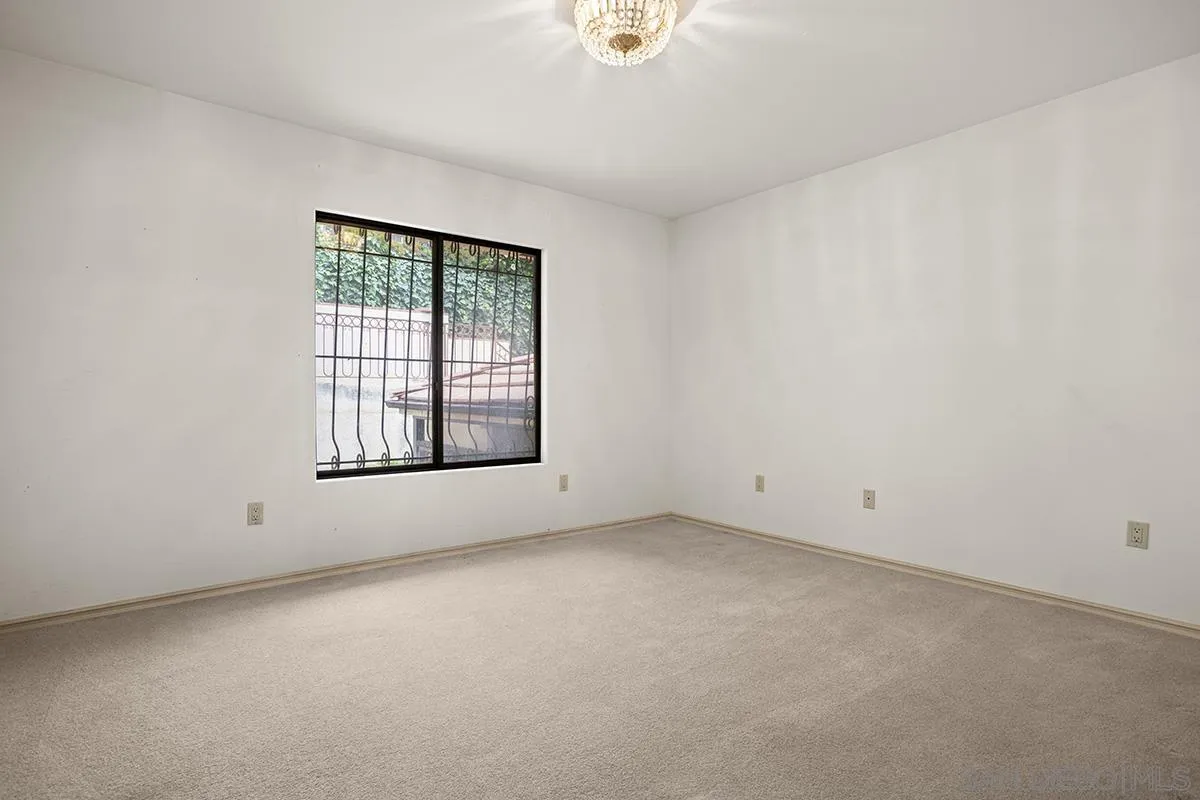 3130 Goldfinch Street San Diego, CA 92103 - Photo 43 of 59 a view of an empty room with a window
