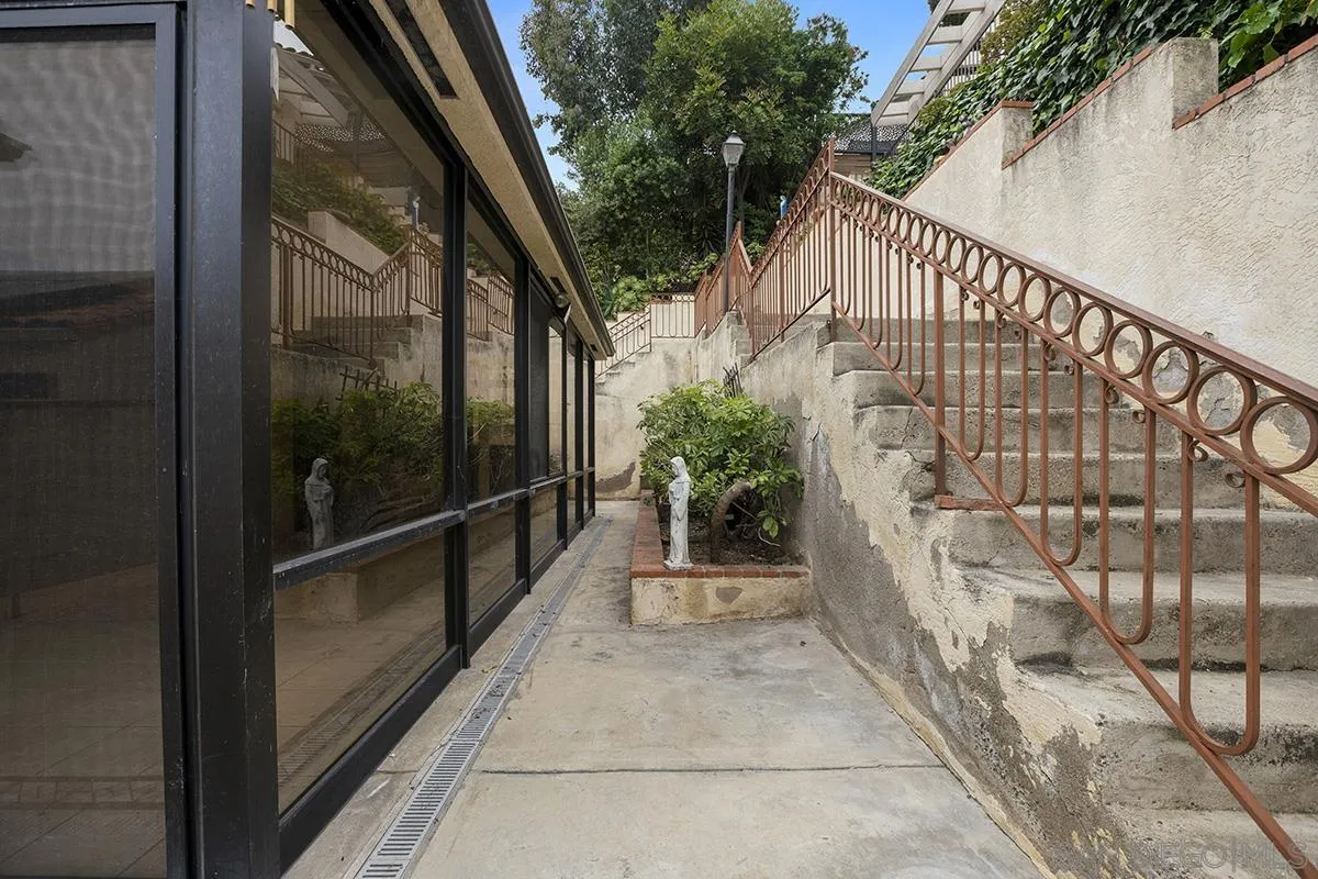 3130 Goldfinch Street San Diego, CA 92103 - Photo 51 of 59 a view of balcony with potted plants