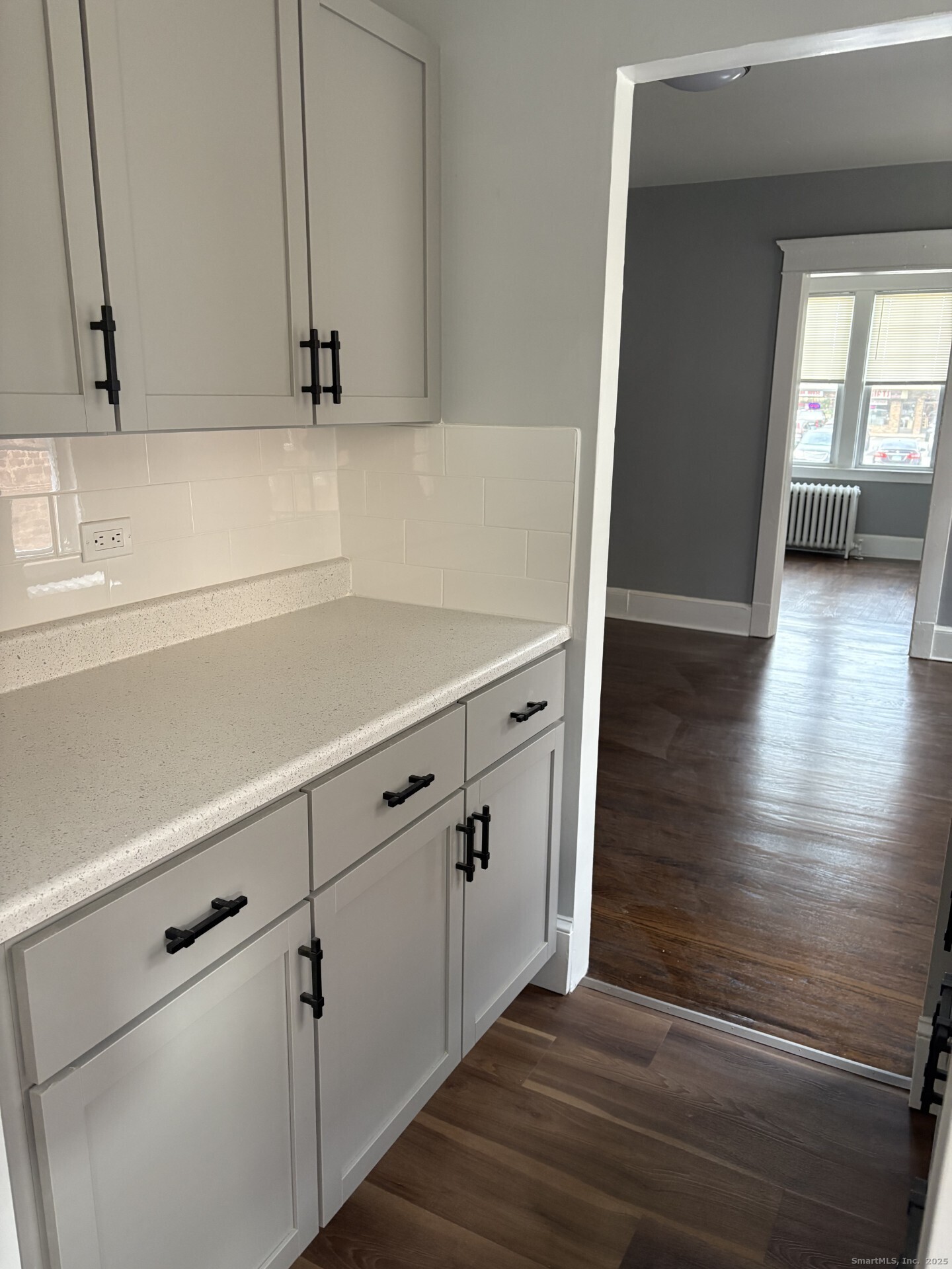 116 Elm Street West Haven, CT 06516 - Photo 4 of 14 a view of cabinets and wooden floor