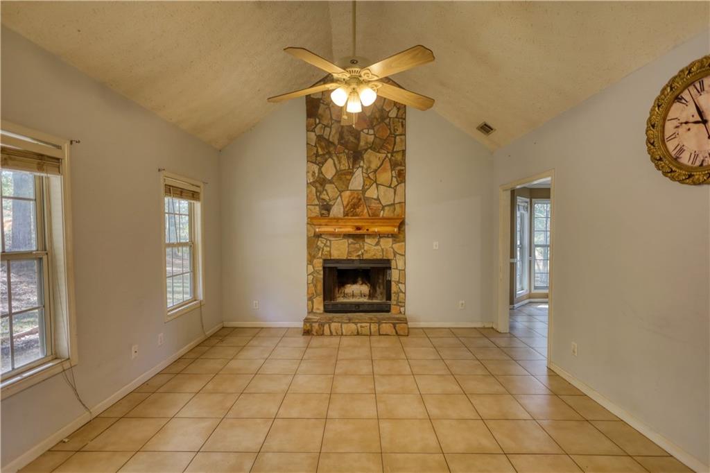 55 Ashland Farm Road Oxford, GA 30054 - Photo 16 of 55 a view of an empty room with window and fire place