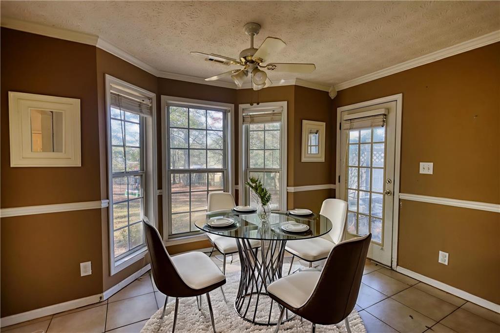 55 Ashland Farm Road Oxford, GA 30054 - Photo 24 of 55 a dining room with furniture and window