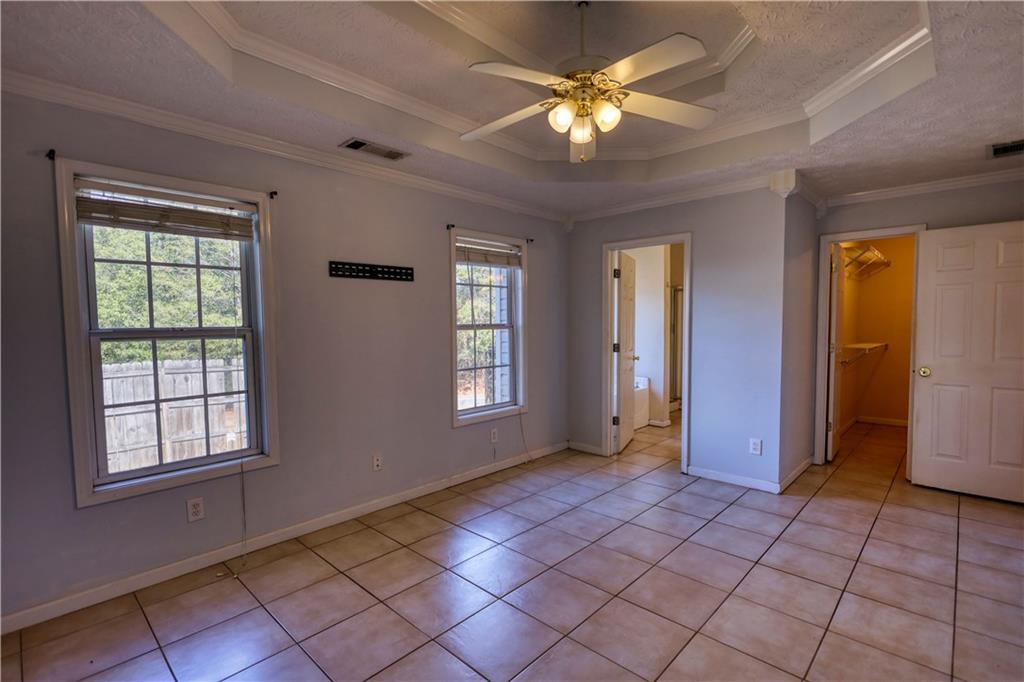 55 Ashland Farm Road Oxford, GA 30054 - Photo 31 of 55 a view of an empty room with window and chandelier fan