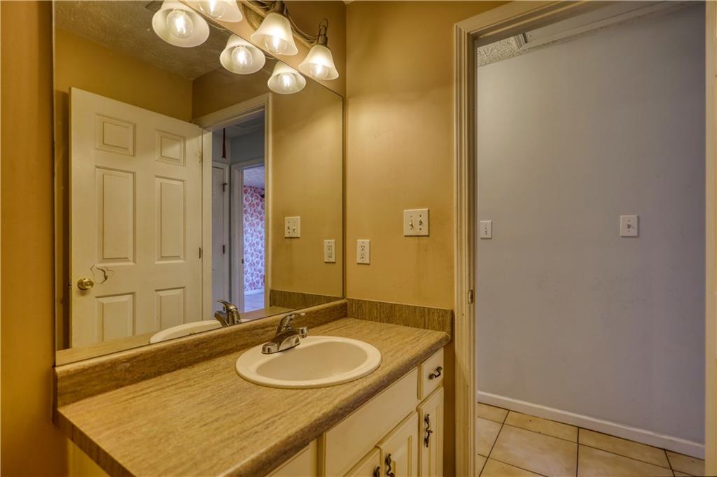 55 Ashland Farm Road Oxford, GA 30054 - Photo 39 of 55 a bathroom with a sink and a mirror