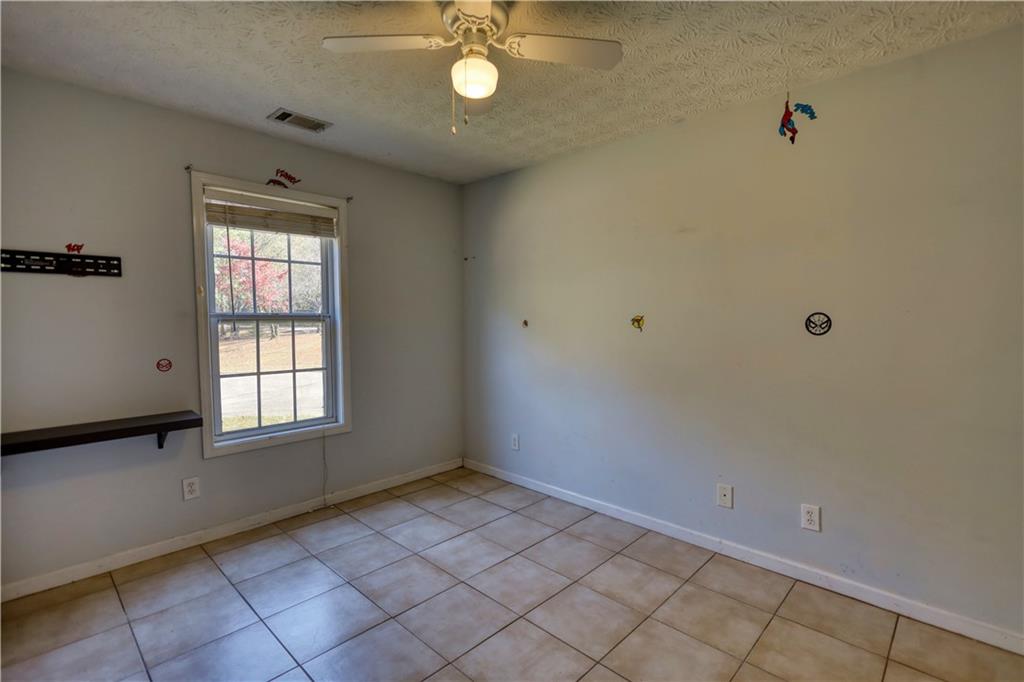 55 Ashland Farm Road Oxford, GA 30054 - Photo 41 of 55 a view of an empty room with a window