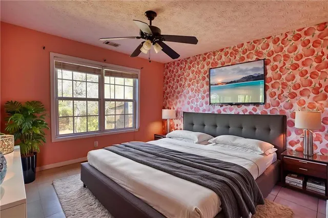 a house with trees in the background