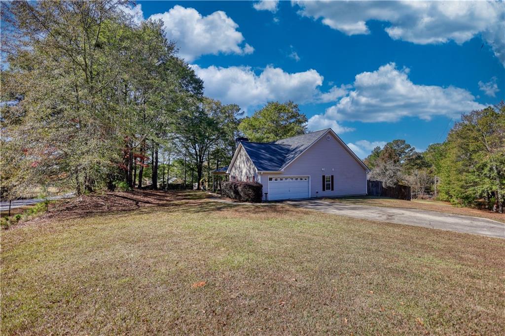 55 Ashland Farm Road Oxford, GA 30054 - Photo 49 of 55 a house with trees in the background
