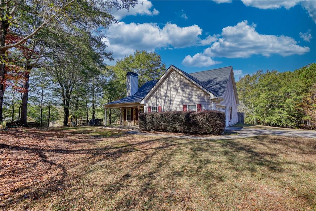 55 Ashland Farm Road Oxford, GA 30054 - Photo 51 of 55 a view of a house with a yard