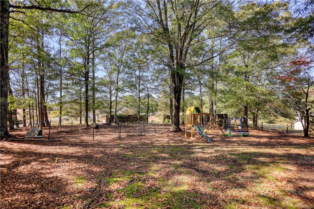 55 Ashland Farm Road Oxford, GA 30054 - Photo 53 of 55 a view of road with trees