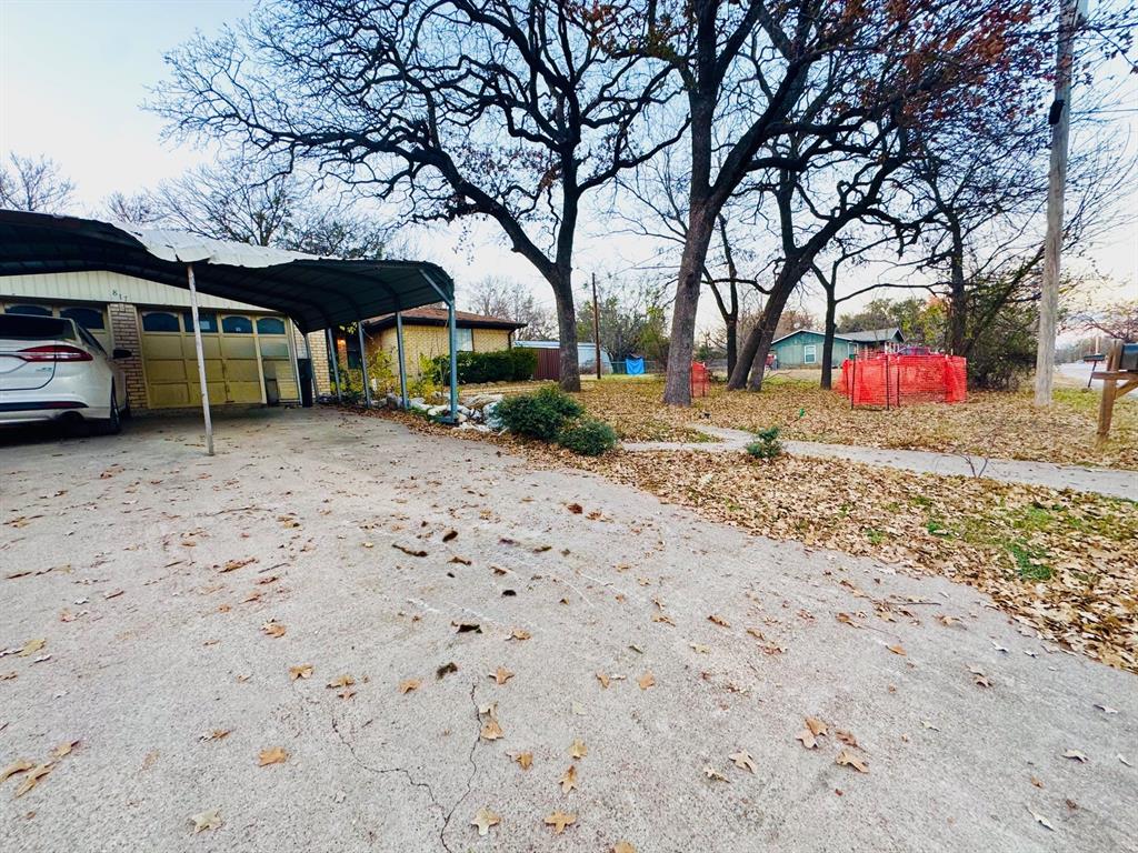 817 South Bell Street Hamilton, TX 76531 - Photo 27 of 28 a view of a house with a yard and sitting area