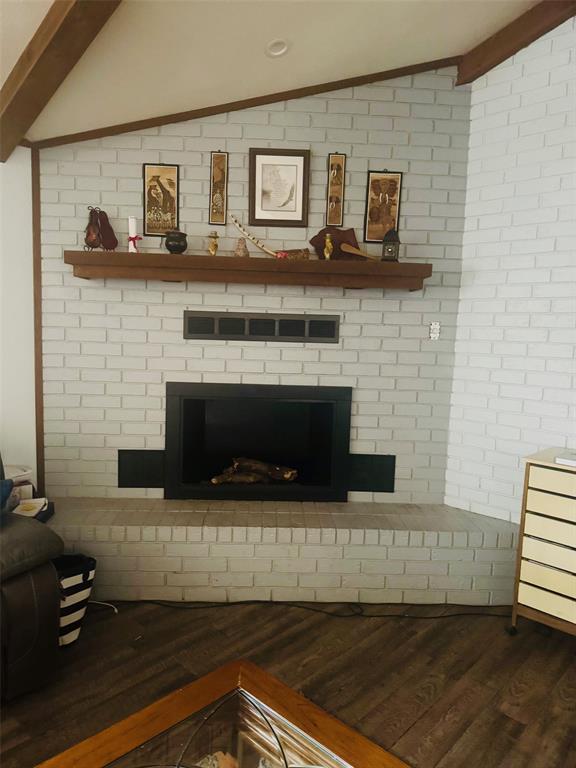 817 South Bell Street Hamilton, TX 76531 - Photo 4 of 28 a living room with furniture and a fireplace