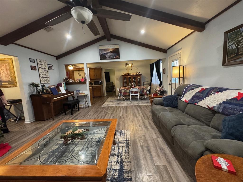 817 South Bell Street Hamilton, TX 76531 - Photo 7 of 28 a living room with furniture and a flat screen tv
