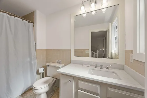 a bathroom with a sink and a toilet