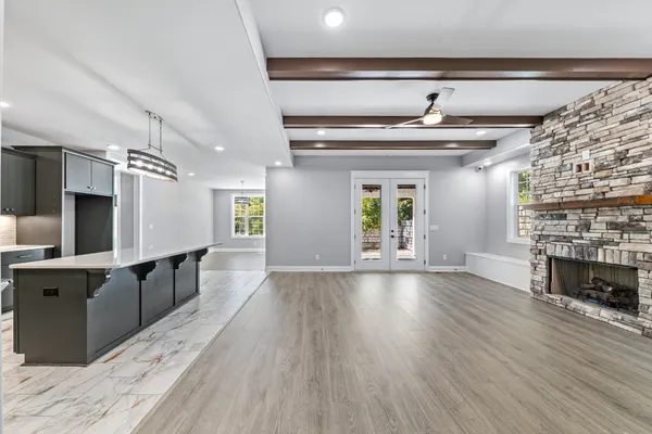 a kitchen with a sink and refrigerator