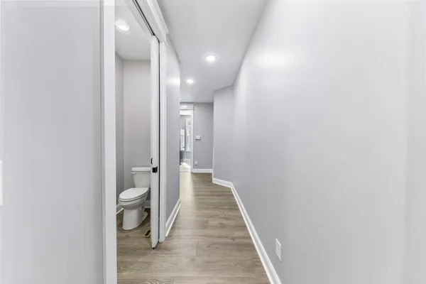 a living room with fireplace furniture and a flat screen tv