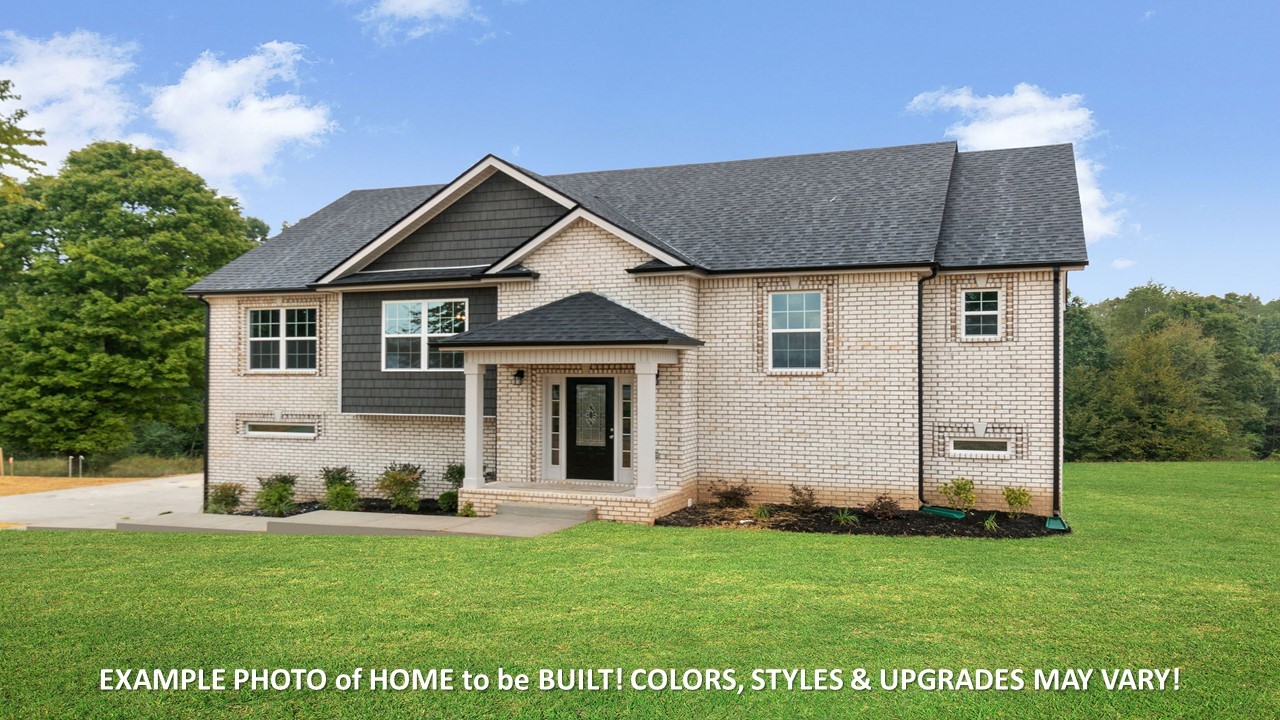 1830 McWhorter Road Cunningham, TN 37052 - Photo 2 of 46 a view of a house with a yard