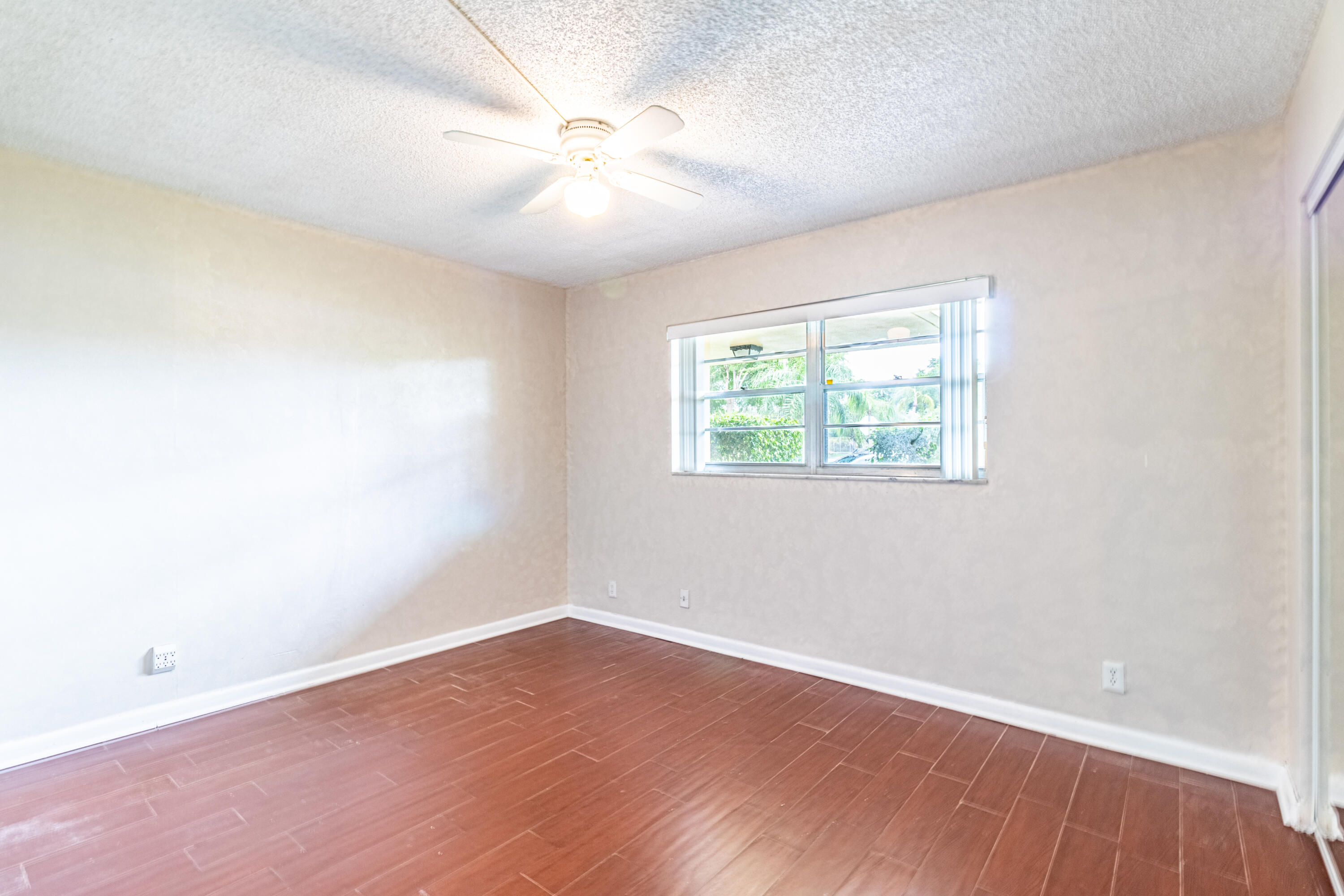 3905 North Nob Hill Road, Unit 103 Sunrise, FL 33351 - Photo 20 of 27 Guest Bedroom