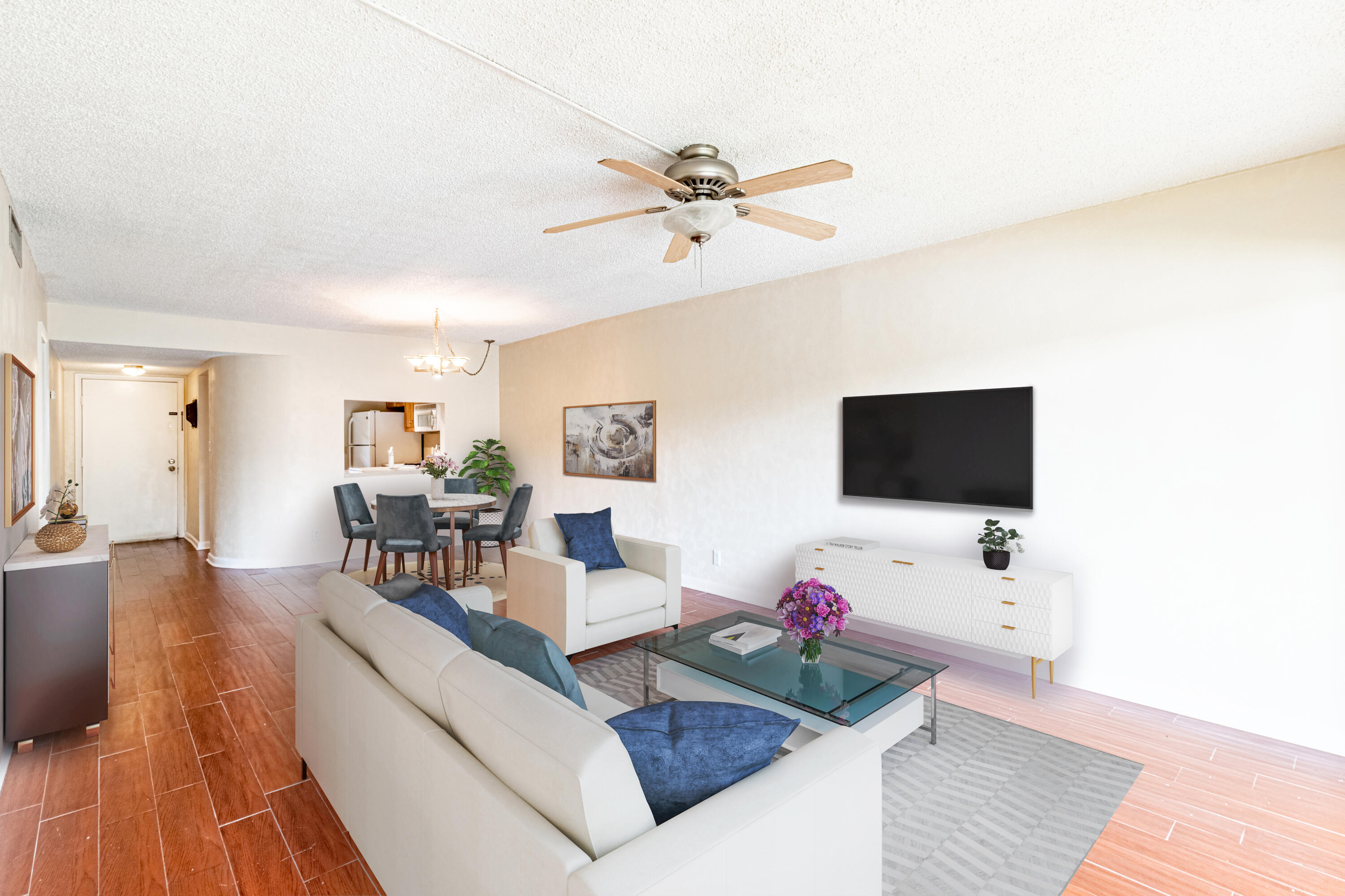 3905 North Nob Hill Road, Unit 103 Sunrise, FL 33351 - Photo 2 of 27 Living Room and Dining Room