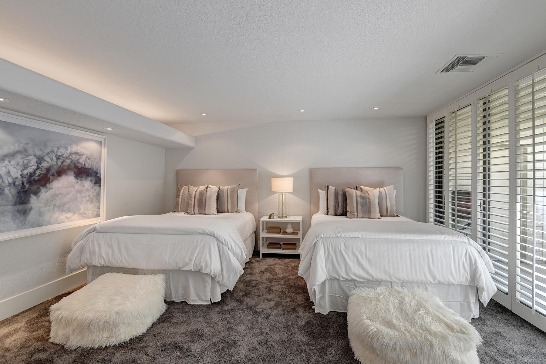 6 Eaton Rancho Mirage, CA 92270 - Photo 26 of 36 a bedroom with two beds and painting on the wall