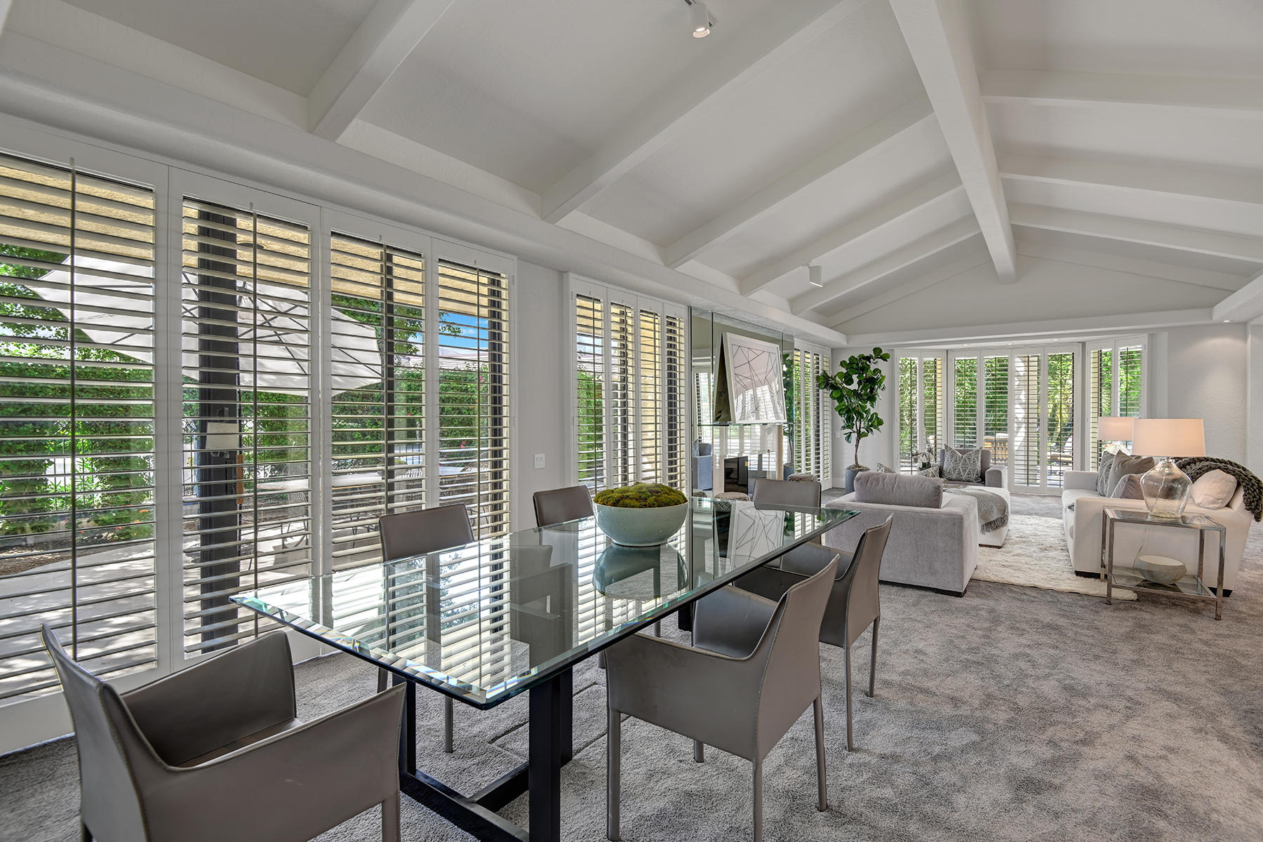 6 Eaton Rancho Mirage, CA 92270 - Photo 8 of 36 a living room with furniture and floor to ceiling windows