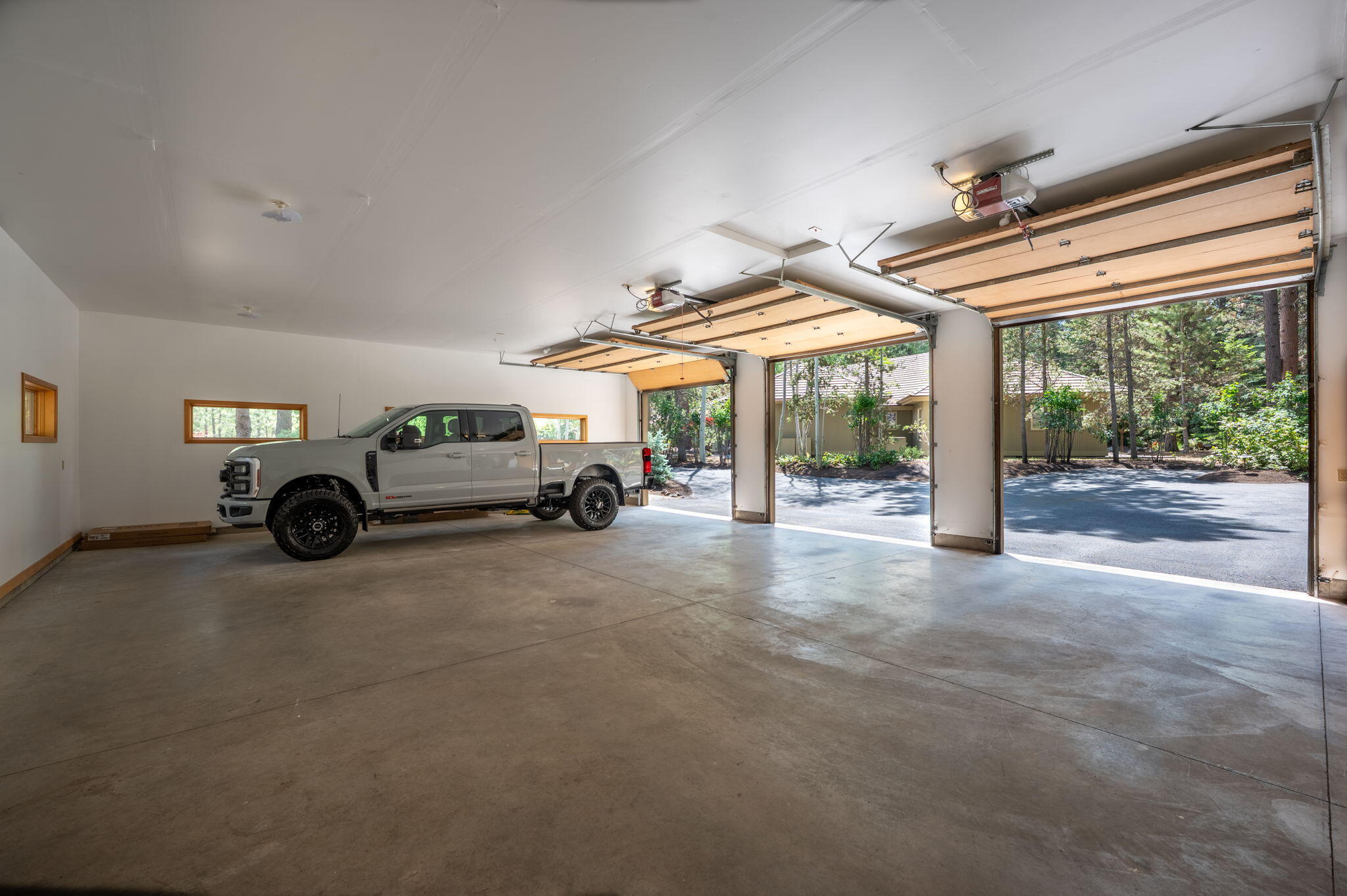 19375 Rim Lake Court Bend, OR 97702 - Photo 52 of 77 10 foot high garage doors