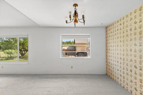 a bathroom with a shower and a sink