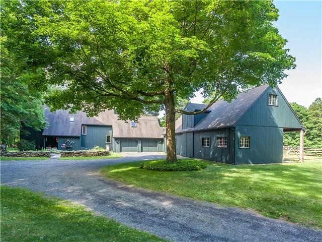 4 Woods Road Sherman, CT 06784 - Photo 1 of 1 a house view with a garden space