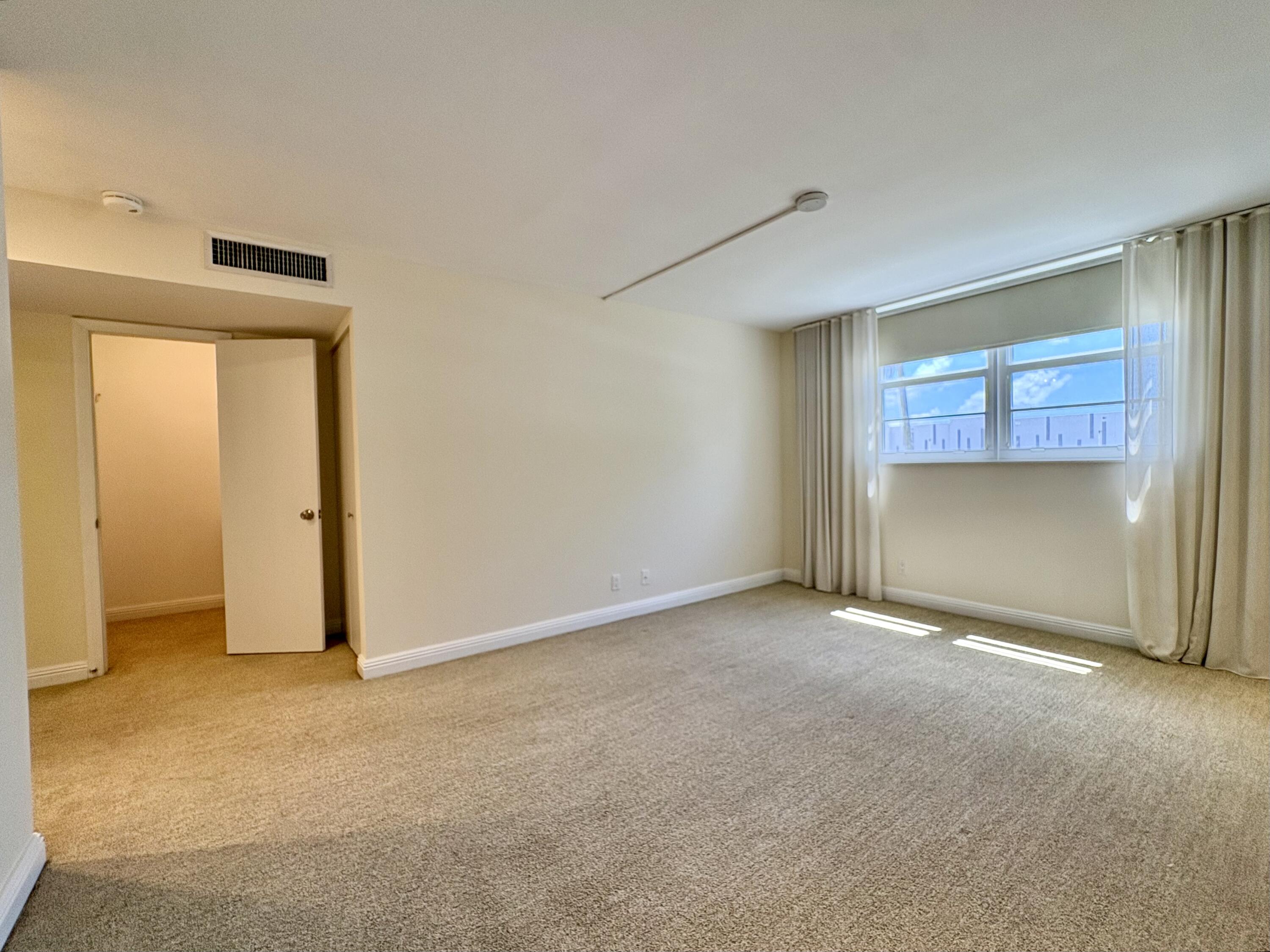 5700 Northwest 2nd Avenue, Unit 203 Boca Raton, FL 33487 - Photo 19 of 29 MASTER BEDROOM